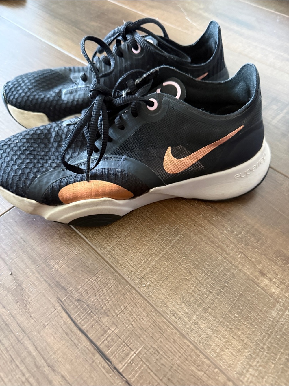 Nike Women's Black and Rose Gold Athletic Sneakers